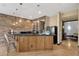 Wet bar with pendant lighting and stone backsplash at 10224 N Azure Vista Trl, Fountain Hills, AZ 85268