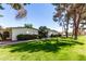 Desirable community with well-manicured green lawns and shady, mature trees at 10511 W Wheatridge Dr, Sun City, AZ 85373