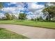 Scenic golf course view with lush green fairways and blue skies, perfect for leisure and recreation at 10511 W Wheatridge Dr, Sun City, AZ 85373