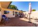 Private patio area with outdoor seating, landscaping, and space for entertaining at 10511 W Wheatridge Dr, Sun City, AZ 85373