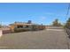 Well-maintained single-story home featuring desert landscaping and mature foliage at 10650 W Riviera Dr, Sun City, AZ 85351