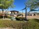 Community playground with playground, benches, shade, and walking paths at 10983 W Mckinley St, Avondale, AZ 85323