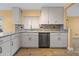 Well-lit kitchen with granite countertops, stainless steel appliances, and tiled floors at 11955 W Granada Rd, Avondale, AZ 85392