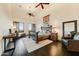 Spacious main bedroom featuring lots of natural light, hardwood floors, and modern furnishings at 13502 E Jomax Rd, Scottsdale, AZ 85262