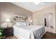 Bright bedroom with a large bed, nightstands, and calm decor at 14000 N 94Th St # 1118, Scottsdale, AZ 85260