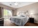 Serene bedroom with a sliding door and neutral color scheme at 14000 N 94Th St # 1118, Scottsdale, AZ 85260