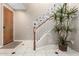 Warm entryway featuring tile flooring, staircase, and decorative accents at 14000 N 94Th St # 1118, Scottsdale, AZ 85260