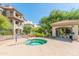 Community hot tub with a shaded picnic area and barbecue grills, perfect for outdoor gatherings at 14000 N 94Th St # 1118, Scottsdale, AZ 85260