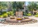 Elegant water feature with decorative bowls and stone accents, surrounded by lush greenery and landscaping at 14000 N 94Th St # 1118, Scottsdale, AZ 85260