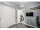 Bedroom with closet, gray walls, and wood-style flooring at 14296 W Surrey Dr, Surprise, AZ 85379