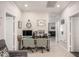 View of home office featuring white flooring and plenty of lighting at 14296 W Surrey Dr, Surprise, AZ 85379