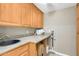 A second view of the butler's pantry with granite counter tops and under counter appliances at 1541 E Hope St, Mesa, AZ 85203