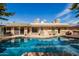 Beautiful backyard pool with views of the home's exterior and patio at 1541 E Hope St, Mesa, AZ 85203