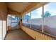 Enclosed patio with large windows allowing for plenty of natural light at 15601 W Hammond Dr, Goodyear, AZ 85338