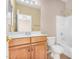 Bathroom with a single sink vanity and shower/tub combo at 17192 W Post Dr, Surprise, AZ 85388