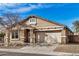 Charming single-Gathering home featuring a two-car garage and well-maintained landscaping at 17192 W Post Dr, Surprise, AZ 85388