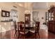 Dining room with hardwood floors and a view of living areas, offering a perfect space for meals and gatherings at 1831 W San Angelo St, Gilbert, AZ 85233