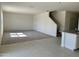 Open-concept living area showing stairs, tile, and carpet at 2063 E Bucking Bronco Dr, San Tan Valley, AZ 85140