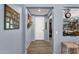 Inviting entryway features wood-look flooring and a view into a cozy bar area at 2463 E Stacey Rd, Gilbert, AZ 85298