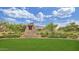 Stone monument with well-manicured landscaping adds charm to the community park at 2463 E Stacey Rd, Gilbert, AZ 85298