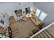 Aerial view of a cozy living room with hardwood floors and a comfortable seating area at 2463 E Stacey Rd, Gilbert, AZ 85298