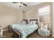 Bedroom featuring carpeted floors, two twin beds, and a window at 25907 N 134Th Dr, Peoria, AZ 85383