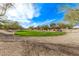 A community park with a playground and green space for outdoor activities and relaxation at 25907 N 134Th Dr, Peoria, AZ 85383