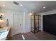 Main bathroom features a glass shower, and vanity with marble countertop and modern lighting at 2946 E Flower St, Phoenix, AZ 85016