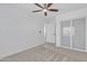 Comfortable bedroom with closet, ceiling fan, and neutral tones, creating a calming and inviting atmosphere at 3050 S Cascade Pl, Chandler, AZ 85248