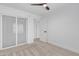 Well-lit bedroom with carpeting, ceiling fan, and closet, providing a peaceful and comfortable space at 3050 S Cascade Pl, Chandler, AZ 85248