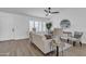 Cozy living room featuring contemporary decor, a ceiling fan, and comfortable seating at 3050 S Cascade Pl, Chandler, AZ 85248