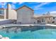 Backyard features a private pool with a waterfall feature, lush landscaping and outdoor living at 3050 S Cascade Pl, Chandler, AZ 85248