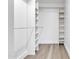 Spacious walk-in closet with custom shelving and ample storage space, perfect for organization at 3050 S Cascade Pl, Chandler, AZ 85248