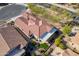 Drone shot of the home, with its desert landscaping and outdoor spaces at 336 N Monterey Ct, Casa Grande, AZ 85194