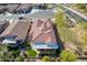 A high angle view of the home, showing patio, landscaping and tile roof at 336 N Monterey Ct, Casa Grande, AZ 85194