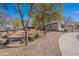 View of the side of the house with desert landscaping in the front yard at 336 N Monterey Ct, Casa Grande, AZ 85194