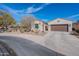 Charming home with desert landscaping and a two-car garage at 336 N Monterey Ct, Casa Grande, AZ 85194