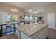 Spacious kitchen seamlessly connects to the living and dining areas, perfect for entertaining at 336 N Monterey Ct, Casa Grande, AZ 85194