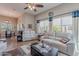 Inviting living room with comfortable seating, natural light, and stylish decor at 336 N Monterey Ct, Casa Grande, AZ 85194