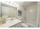 Bright bathroom with a vanity, toilet, and shower-tub combination at 3420 W Danbury Dr # C216, Phoenix, AZ 85053