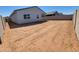 Expansive backyard with block fencing, awaiting landscaping to create your own outdoor oasis at 3508 E Audrey Dr, San Tan Valley, AZ 85143