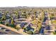 Expansive aerial view of a residential neighborhood showcasing tree-lined streets and well-maintained homes at 3531 E Becker Ln, Phoenix, AZ 85028