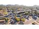 A high angle view showing the home's landscaping, pool, and location in a residential neighborhood at 3531 E Becker Ln, Phoenix, AZ 85028