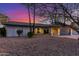 Charming single-story home featuring a well-manicured front yard and a two-car garage at 3531 E Becker Ln, Phoenix, AZ 85028