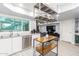 Contemporary kitchen featuring stainless steel appliances, sink, and a sleek countertop space at 3531 E Becker Ln, Phoenix, AZ 85028