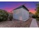 Backyard outbuilding featuring durable siding and rock landscaping at 3531 E Becker Ln, Phoenix, AZ 85028