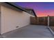 Spacious side yard featuring a wooden gate and a painted brick wall at 3531 E Becker Ln, Phoenix, AZ 85028