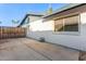 Side yard showing a wooden gate and access to the backyard at 3531 E Becker Ln, Phoenix, AZ 85028