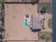 Aerial view of the property showcasing backyard pool, gazebo, two-story home, and surrounding land at 3707 N 188Th Ave, Litchfield Park, AZ 85340