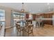 Bright kitchen with stainless steel appliances and a center island with barstool seating at 3707 N 188Th Ave, Litchfield Park, AZ 85340